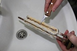 A vízmelegítő fűtőelemének tisztítása