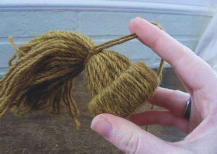 The hanging loop can be made from the same thread