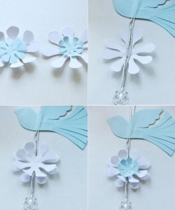 Use a toothpick to slightly bend the flower petals and tail of the pigeon.