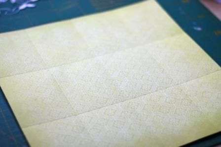 Prepare a sheet of thick paper that you want to fold so that you get 12 identical squares when unfolded.