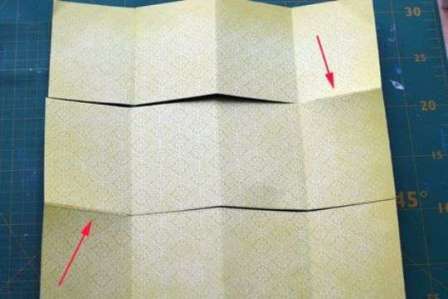 Now you need to make cuts as in the photo, leaving a square uncut on one side and the other.