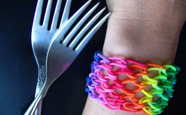 Weaving a rainbow bracelet on a fork