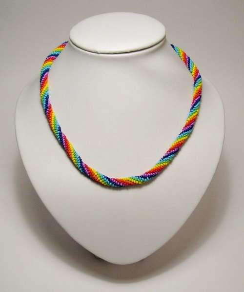 If we continue weaving, then the bracelet can be turned into a bright and iridescent decoration on the neck.
