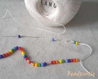 Taking into account the scheme, it is necessary to string the beads using a special needle
